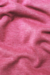 Fototapeta na wymiar burgundy viva magenta wrinkled plush fabric background texture, soft material pattern
