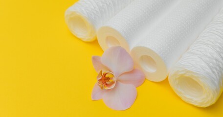 cartridges for water purification on a yellow background. Concept of clean water at home
