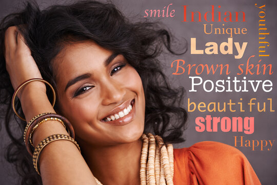 Beautiful, confident and portrait of a woman with words of affirmation isolated on a studio background. Happy, smile and face of an Indian model with an overlay message, empowerment and backdrop text
