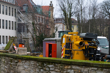 Construction shredder machine of yellow color at the construction site.