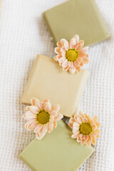 Obraz na płótnie Canvas Natural aroma homemade soap with flowers