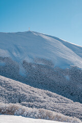 Italy, January 2023 - beautiful winter landscape on mount Catria after a heavy snowfall and frost. It expresses well the concept of peace, silence and freedom in nature