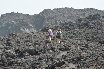 Hiking from Playa de Las Malvas towards Timanfaya along the volcanic coast in Lanzarote