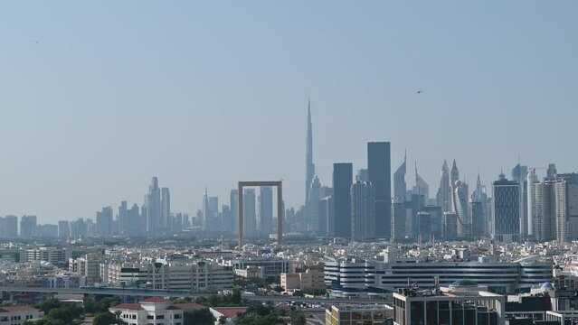 4K: Morning view of Dubai skyline and Burj Khalifa, including Dubai Frame, Dubai Metro Line, UAE skyscrapers