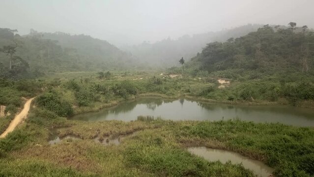 Low flight over abandoned surface gold mine in Ghana