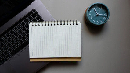 office clock and notepad