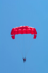 parasailing over the sea, active entertainment for tourists and vacationers in Turkey