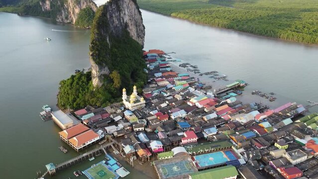 Amazing aerial view of floating fisherman village Ko Panyi in Thailand, Asia. Tropical drone landscape.