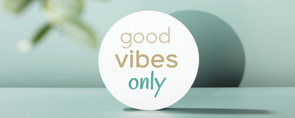 Quote Only good vibes on White Cylinder podium with eucalyptus leaves Banner