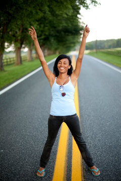 A woman stands in the middle of the road in Butler, Maryland.