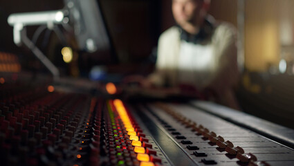 Music mixer, sound board and producer in radio industry, broadcast and scales in studio. DJ...
