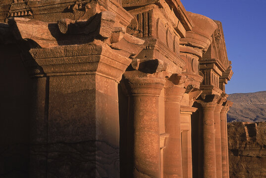 Petra Monastery--  On top of carved tower  of the Monastery with Bedouin guide Mohamed Bedoul. The ancient  city of Petra, the former Nabataean capital, was entirely carved in the 