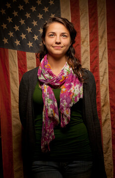A woman poses for a portrait as a first time voter in the November 2012 United States Presidential Election for a project on new amercian voters.