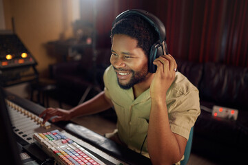 Headphones, recording studio and man music producer working a album, song or audio with equipment. Happy, smile and African male radio presenter playing playlist with technology in creative workplace - obrazy, fototapety, plakaty