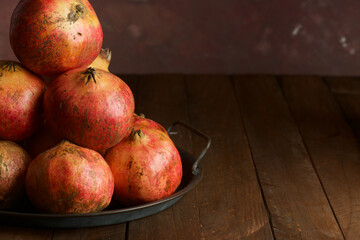 Pomegranates on a metal tray