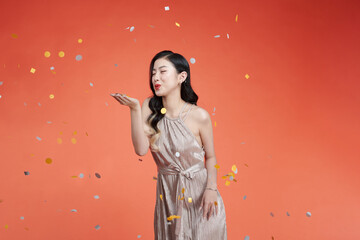 Photo of girlish millennial party lady blow confetti wear sparkling dress