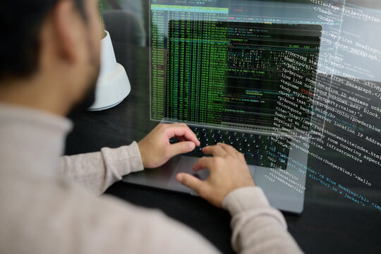 Programmer, man and laptop coding on hologram, software development or cloud computing. IT engineer, server overlay and computer code of website, digital algorithm or big data of networking developer