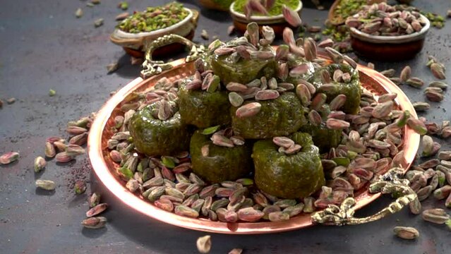 Traditional turkish baklava pistachio pastry. Dilberdudagi, ozel kesim baklava, cikolatali baklava, fistikli baklava, katmer, fistikli kadayif, kattafi, fistik sarma, soguk baklava, midye baklava, cev