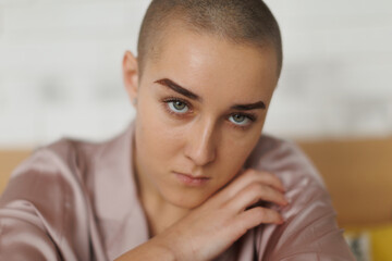 Fototapeta na wymiar Portrait of unhappy pensive woman with cancer.