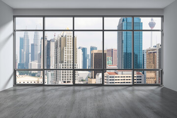 Obraz premium Downtown Kuala Lumpur City Skyline Buildings from High Rise Window. Beautiful Expensive Real Estate overlooking. Empty room Interior Skyscrapers View Malaysia. Day time. 3d rendering.