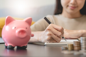 Close up hands of a Woman doing investment accounting for future wealth.