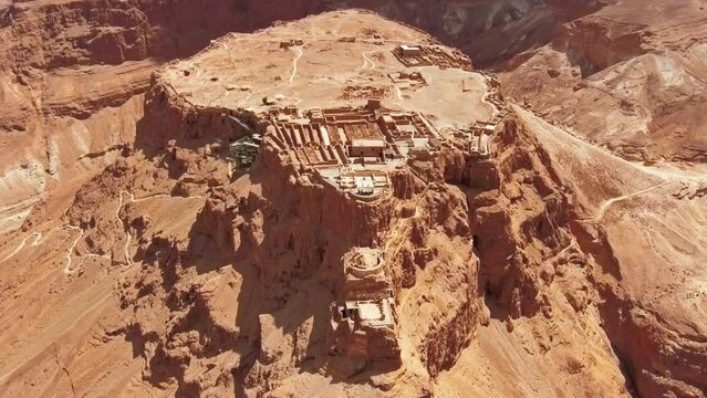 The Masada fortress, Masada is an ancient fortification in the Southern District of Israel situated on top of an isolated rock plateau, akin to a mesa. It is located on the eastern edge of the Judaean