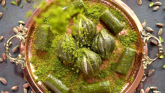 Traditional turkish baklava pistachio pastry. Dilberdudagi, ozel kesim baklava, cikolatali baklava, fistikli baklava, katmer, fistikli kadayif, kattafi, fistik sarma, soguk baklava, midye baklava, cev