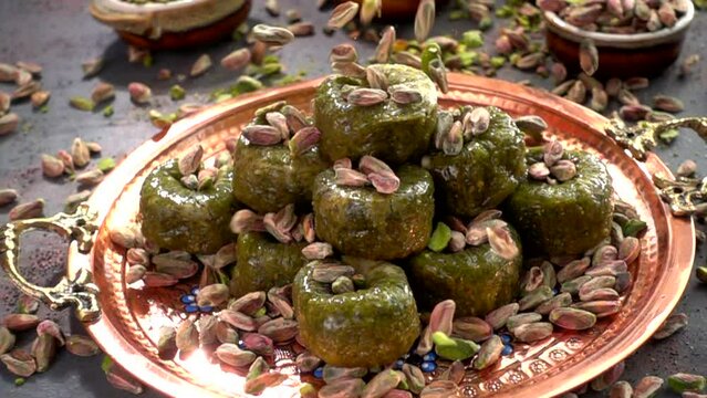 Traditional turkish baklava pistachio pastry. Dilberdudagi, ozel kesim baklava, cikolatali baklava, fistikli baklava, katmer, fistikli kadayif, kattafi, fistik sarma, soguk baklava, midye baklava, cev