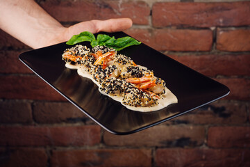 Appetizing fried shrimp with sesame seeds