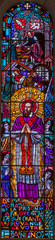 Naklejka na ściany i meble ANNECY, FRANCE - JULY 11, 2022: The St. Francis de Sale on the stained glass of Basilique de la Visitation church designed by Ch. Plessard and made by M. Chigot (20. cent.)