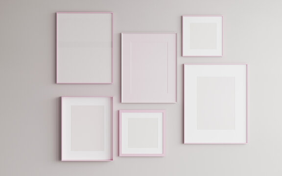 Empty pink painted frames mockup on wall. Decorative black frames.White wall background. Template for artwork, painting, photo or poster. 3d rendering