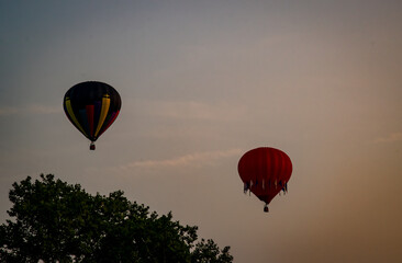Morning Sunrise Launch Of Hot Air Balloons During a Balloon Festival on Summer Day
