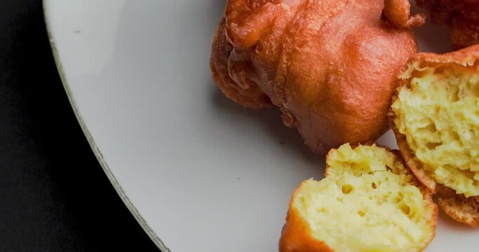 Orang-orang cake is a typical snack from Indonesia. Made from a mixture of wheat flour and bananas, then fried.