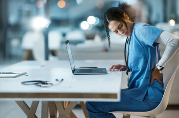 Back pain, stress and doctor in her office at the hospital working on a diagnosis or cure....