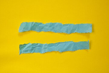 Title: Set of torn paper piece isolated on yellow background