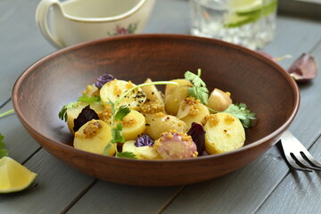 Simple salad with young potatoes with mustard-lime sauce