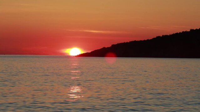 Time lapse clip. Spectacular sunset on Livadhi beach, Himare location. Picturesque summer evening in Albania, Europe. Incredible seascape of Adriatic sea. Full HD video (High Definition)..