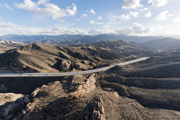 Fototapeta na wymiar Aerial view of the 14 freeway near Santa Clarita, Canyon Country and Agua Dulce in Los Angeles County, California.