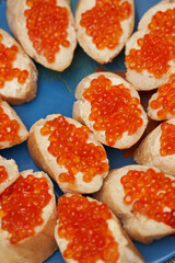 caviar with butter background. red caviar with butter close-up. caviar.