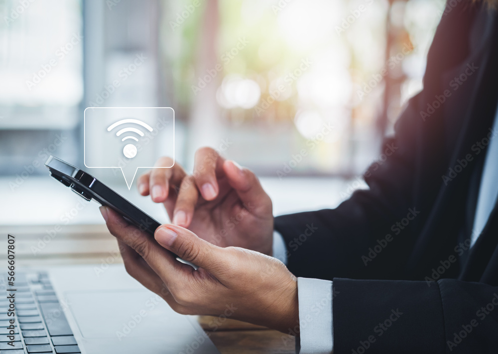 Poster share wifi by smart mobile phone. sharing icon appear on cell phone holding by business people in su