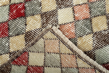 Textures and patterns in color from woven carpets