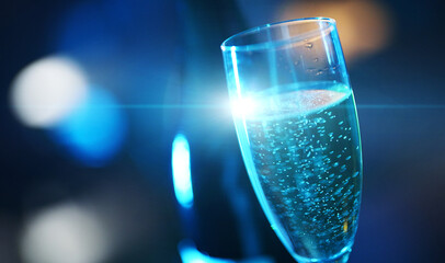 Glass of champagne and a bottle in the club.