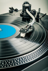 Playing a vinyl record on a turntable