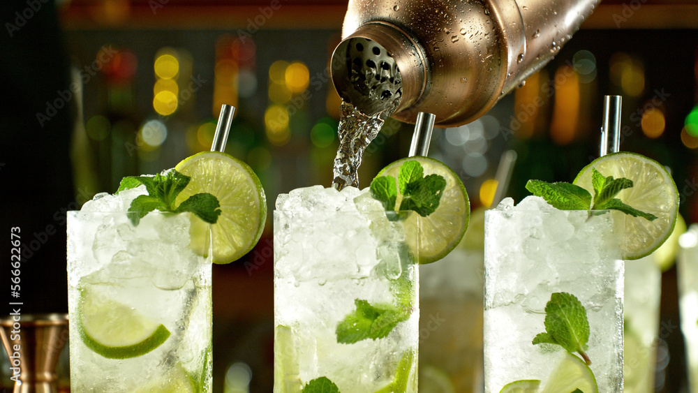Poster preparation of mojito drinks on bar counter.