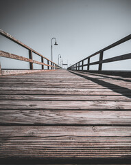 wooden bridge over the sea