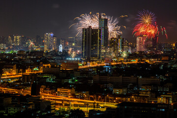 The blurred background of fireworks (light trails) is beautiful at night, seen in the New Year holidays, Christmas events, for tourists to take pictures during public travel.