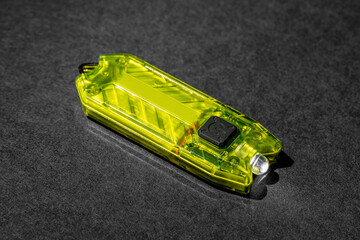 Modern aluminum LED Pocket Flashlight isolated on white background. 