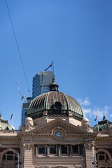 Fototapeta na wymiar The roof of Flinders Street Station overlooking the sky in Melbourne, Australia.