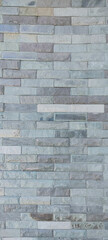 The abstract texture of the cladding stone wall surface. for background design fill text