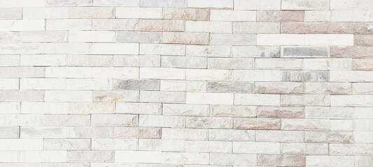 The abstract texture of the cladding stone wall surface. for background design fill text
